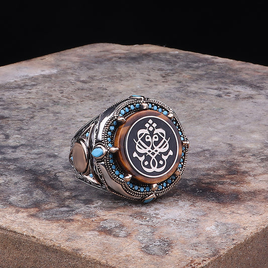 Men Dakka Dukka ( Eden Bulur ) İşlemeli Kaplan Gözü Taşlı 925 Ayar Erkek Gümüş Yüzük