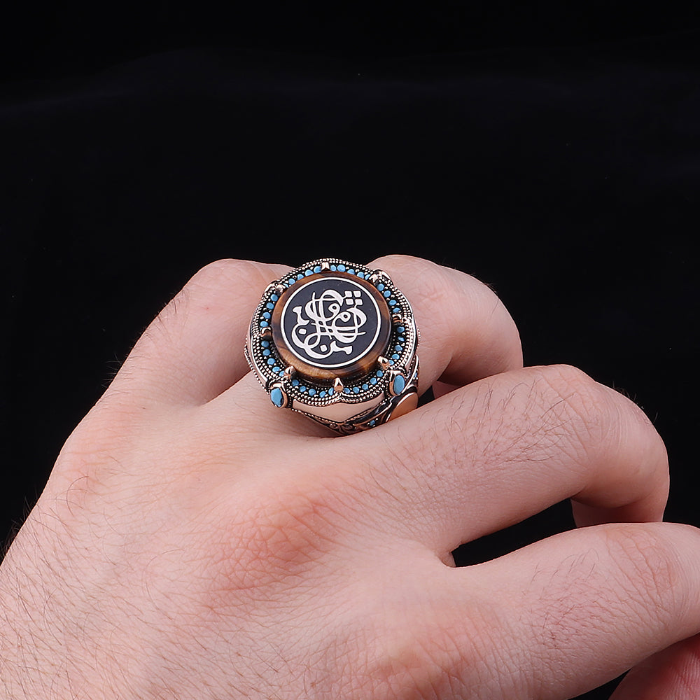 Men Dakka Dukka ( Eden Bulur ) İşlemeli Kaplan Gözü Taşlı 925 Ayar Erkek Gümüş Yüzük